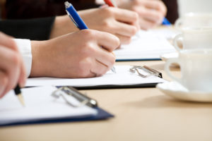 IWM-Aktuell iStock_8728943_XLARGE-300x200 Hands taking notes.  